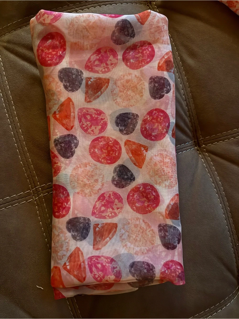 12 scarfs. All different styles and colors. Selling in a lot. All for